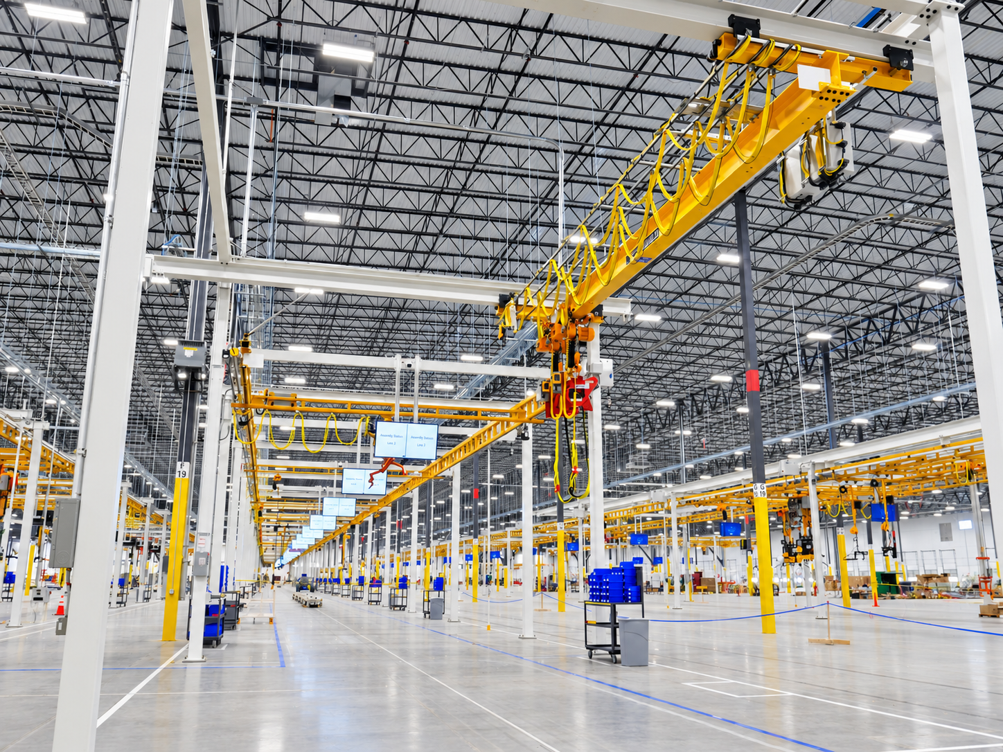 Overhead material handling systems in a modern industrial facility